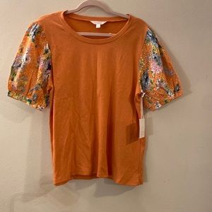 Orange blouse with floral puff sleeves